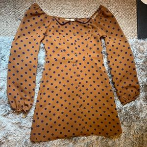 Tan and navy blue polka-dot dress